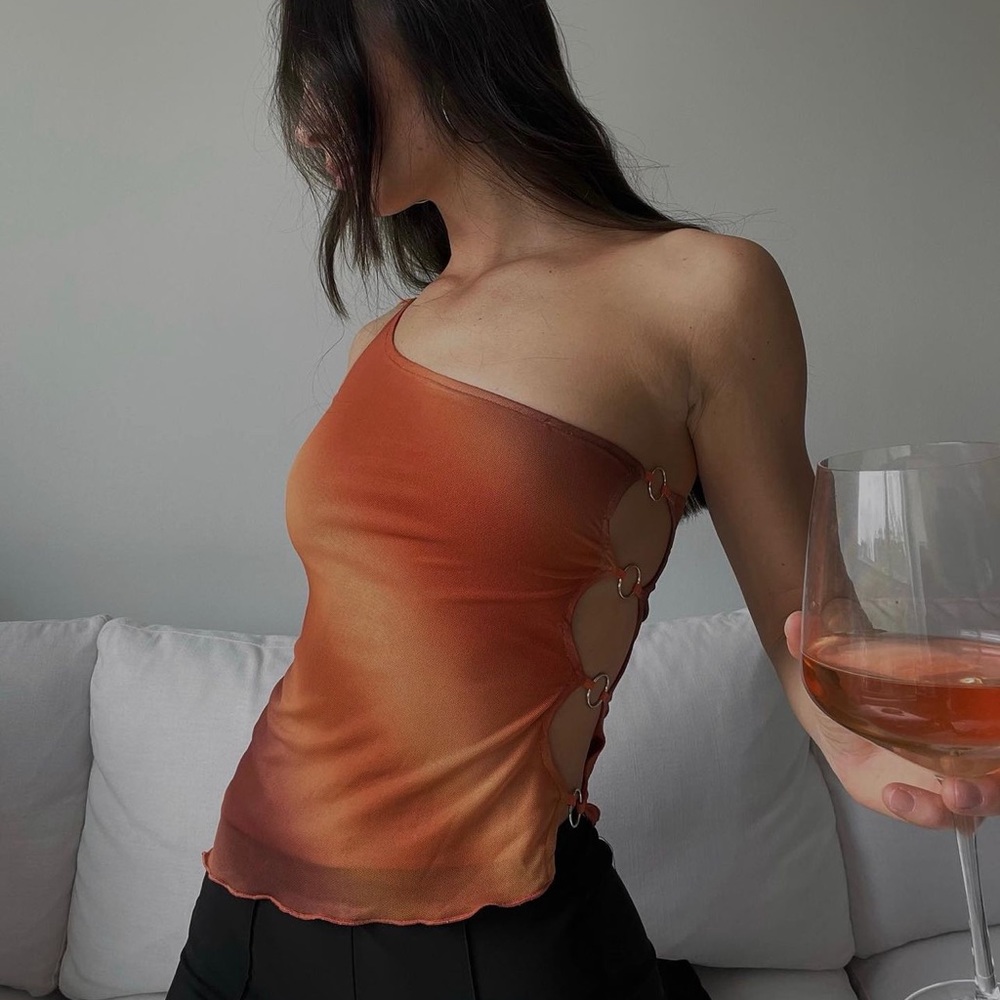 orange patterned top